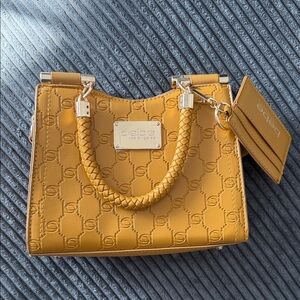 bebe Quilted Logo Satchel in Mustard Yellow with Braided Handles